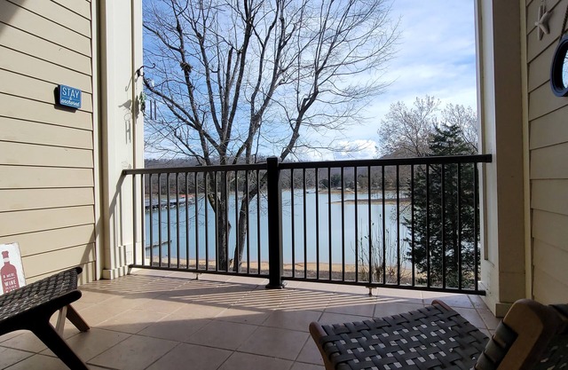 Water view condo w/ free attraction tickets, a jetted tub, & fireplace