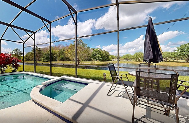 Water view retreat with lanai, heated pool, pool spa, game room, & AC