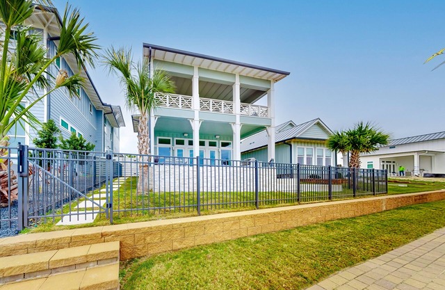 Waterfront home with private pool, community kayaks, grill, open layout, & AC