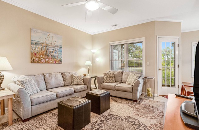 Well-stocked Creekwood townhome with pool, balcony, board games, W/D, & AC
