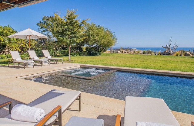 West Enclave 8: 1 Row Back from Staircase to Beach on Grounds of Luxury Resort.