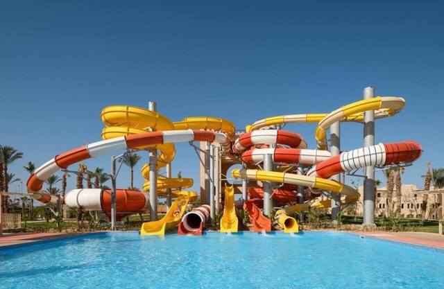 Your Relaxation & Adventure Hub: Waterpark, Theater Show & Private Beach Access
