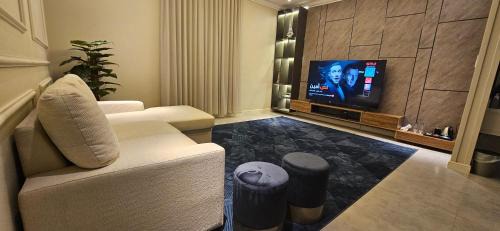 Riyadh Apartamento | شقة أنيقة مودرن بدخول ذكي و سطح بجلسة خارجية