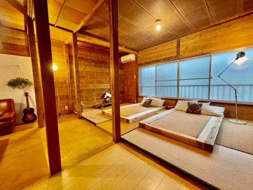 Shimoda Villa | 三丁庵 貸別荘 水質AAビーチまで徒歩15分ペリーロードまで徒歩5分最高なロケーション 下田を遊び尽くせる貸別荘 無料駐車場もありますJapanese old style guest house that 2 minutes walk to Perry Road 15ninutes walk to Nabeta beach