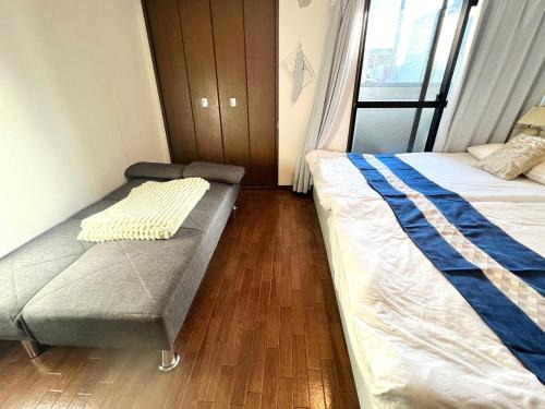 Naniwa Apartamento | 大国町駅徒歩3分 なんば駅1駅 最大6名 ロイヤル603