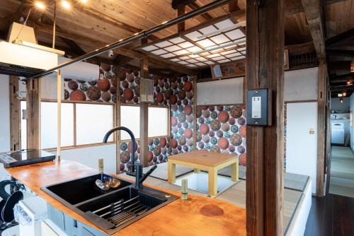Iwaki Apartamento | 温泉徒歩30秒 一棟貸切で最大15名まで 広々キッチンで自炊可