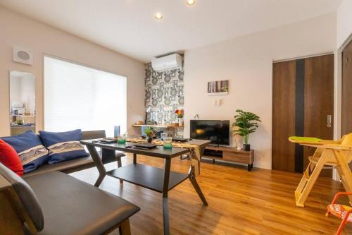 Naha City Centre Villa | 駐車場にコインランドリー畳部屋にお布団も敷けます最上階4階Room