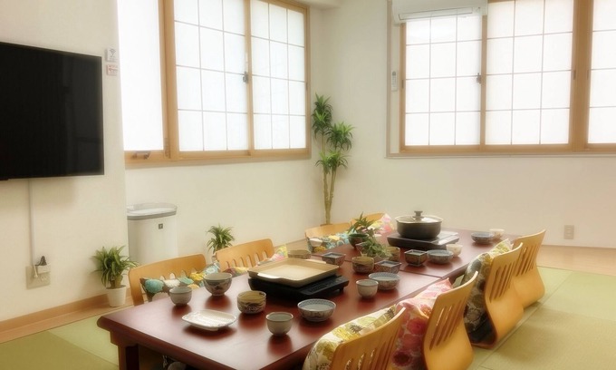 Nishi Apartamento | 1 minute walk from the station in a good location! Accommodates 10 people! Rooftop BBQ available! Renovated! 3 bedrooms! 7 minutes to USJ! It takes 10 minutes to Namba by train! WIFI available