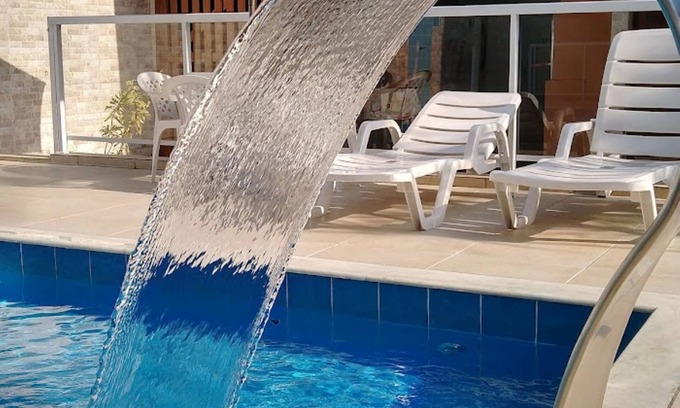 Ipiranga Apartamento | Apartamento de 2 dormitorios, amueblado con piscina, patio y barbacoa