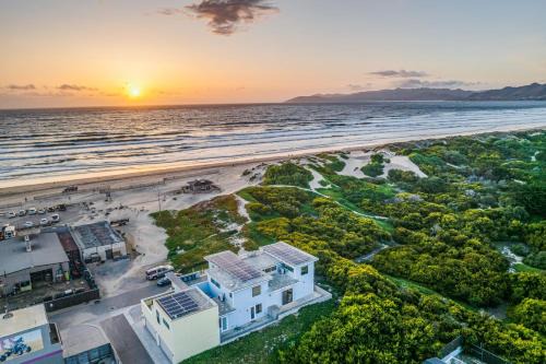 Oceano Casa | 2 Oceanfront Homes w Rooftop Deck Views Steps to the Sand