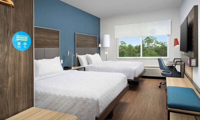 Florida Central Atlantic Coast Hotel | 2 Queen Rooms Near SeaWorld Orlando | w/Free Breakfast & Pets are Welcome