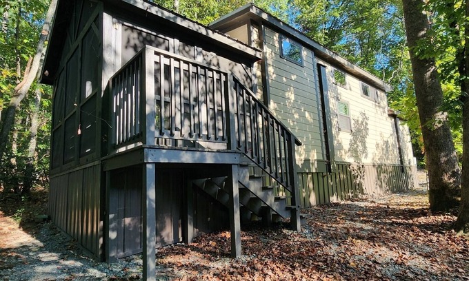Mill Spring Casa | 2-story creek side tiny home, dog-friendly, screened in porch, quick walk to pool and playground, sleeps 6.