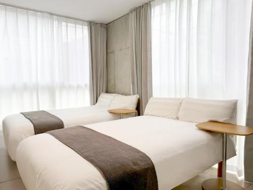 Higashinippori Apartamento | 202Room,7-minute walk from Uguisudani Station located on the 2nd floor of an apartment-style building Twin room No elevator