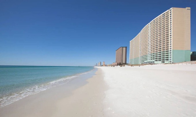 Panama City Beach Hotel | 2BD/Panama City Beach - Oceanfront View with Full Kitchen, Pools, Bar, and More!