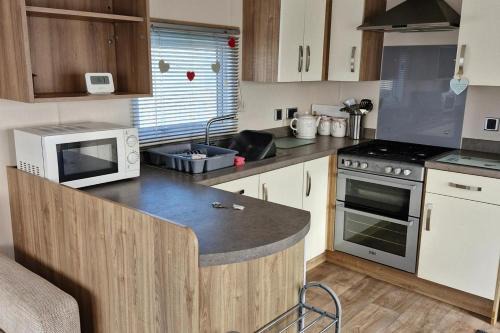 Chapel Saint Leonards Chalet De Esquí | 3-Bed Caravan - Sleeps 8 - Pool