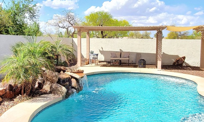 Canyon Trails Casa | 3-bedroom house backyard oasis Pool, dogs ok, free WiFi in Goodyear