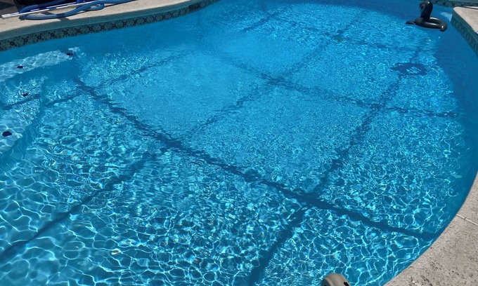 Arlington Casa | 3-bedroom house in Jacksonville with fenced backyard and screen enclosed pool.