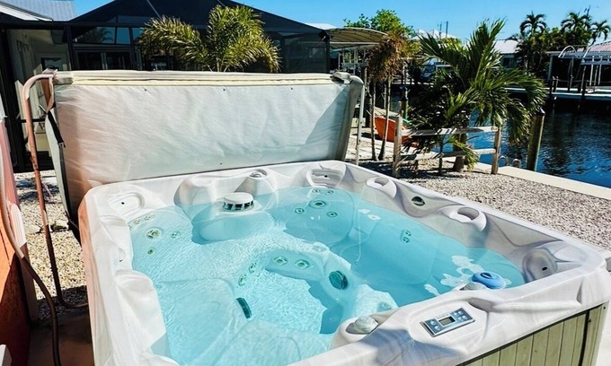 Matlacha Casa | 3BR Waterfront townhome Matlacha with hot tub, boat dock WiFi, bikes and kayaks