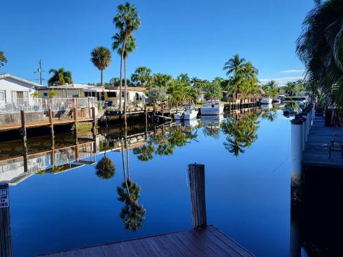 Garden Isles Casa | 4 bd Near beach spacious solar heated pool waterfront home