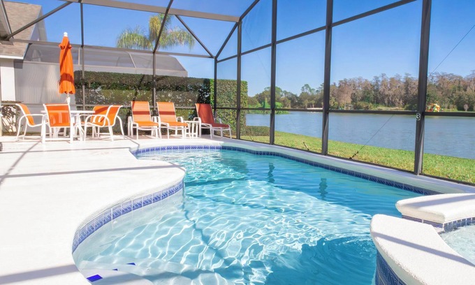 Lake Berkley Villa | 4 Bedroom Home with Tranquil Lakeview Pool/Spa & Game Room (close to Disney!)