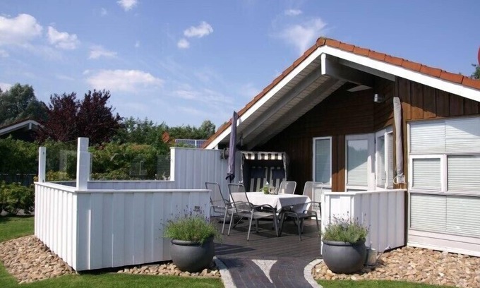 Norderteil Casa | 4 person luxury holiday home with sauna, wood-burning stove, air conditioning, canoe and lake view in Otterndorf