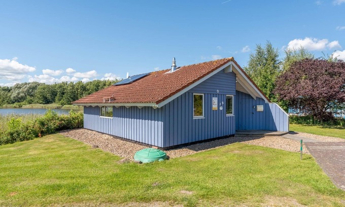 Norderteil Casa | 4-person vacation home with wood-burning stove, canoe and wonderful lake view in Otterndorf