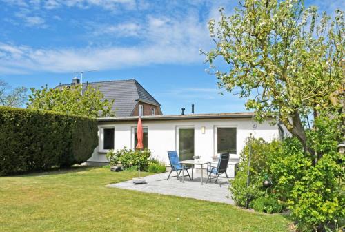 Gager Apartamento | 4 - Sterne Ferienhaus Am Brink mit Gartenter und Meerblick