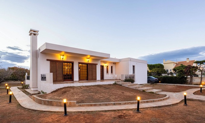 Spata-Artemida Villa | 50m by the Sea offers a spacious holiday villa, ensuring comfort for all guests.
