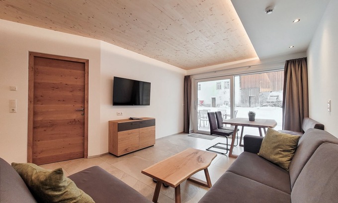 Bichlbach Apartamento | 50m² modern vacation apartment with terrace, free bathing lake, 100m to the ski area