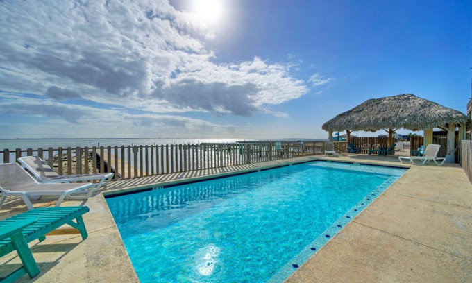 Flour Bluff Casa | 6BDR, Balcony w/ Bay View, Shared Pool + Boat Dock | Keeper Red by AvantStay