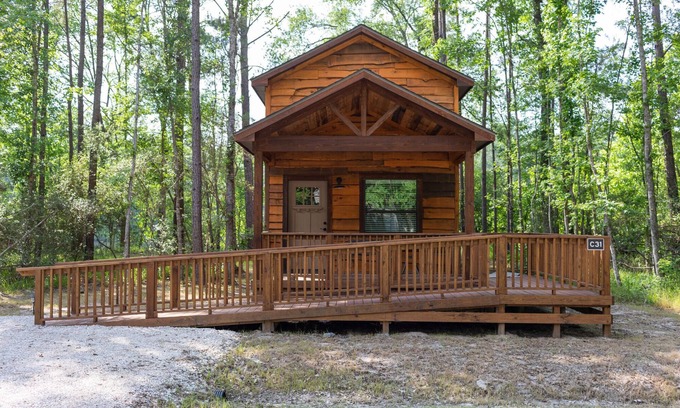 Livingston Cabina | A cozy little ADA accessible getaway right on Kickapoo Creek. Two Creeks Crossing Resort
