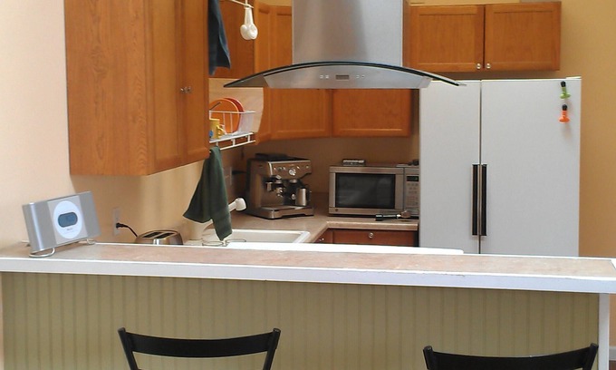 Riverview Casa | Un acogedor Urban Cottage