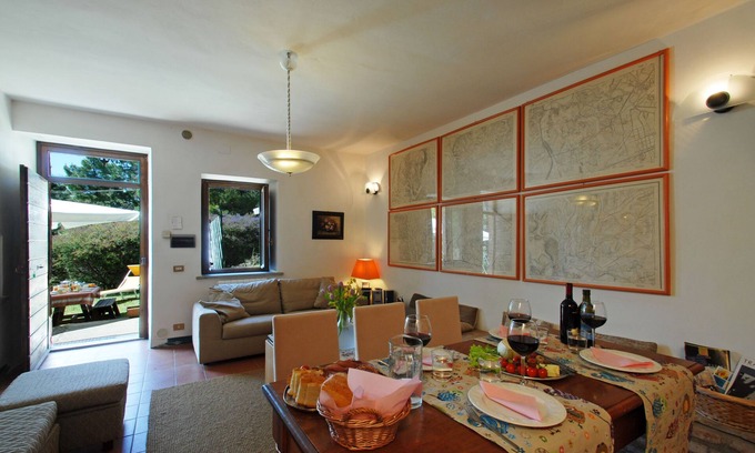 Citta della Pieve Casa | A farmhouse in a large forest on a mountain with an immense view around it.