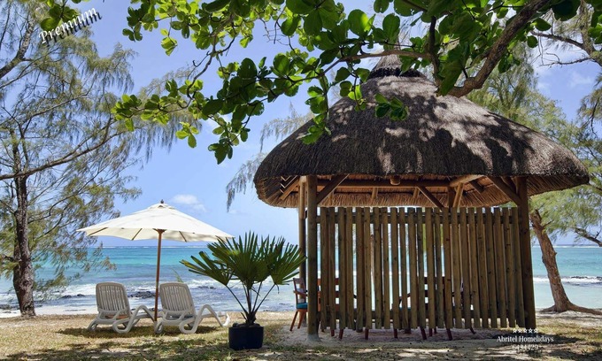 Belle Mare Villa | Mon petit coin de paradis Adorable casa de playa, pies en el agua playa privada