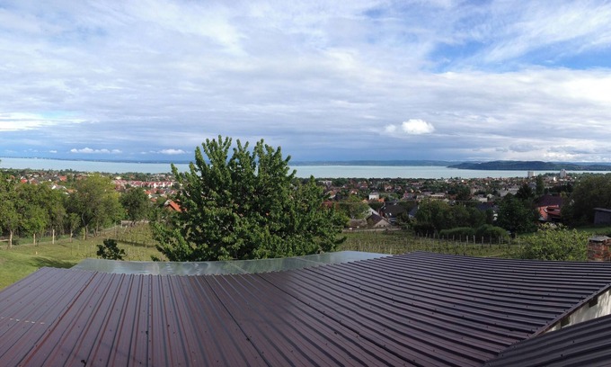 Balatonfured Casa | A newly renovated old wine cellar with a view of Lake Balaton and the city.