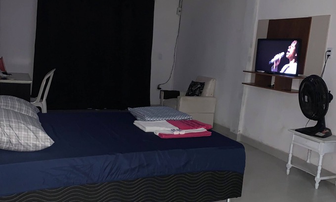 Araruama Casa | A street by the bus station, with air conditioning.