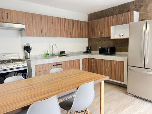 Financial District Apartamento | Acogedor Departamento en Planta Baja, Excelente Precio y Ubicación