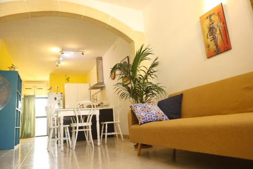 Balzan Apartamento | Adinkra Suits