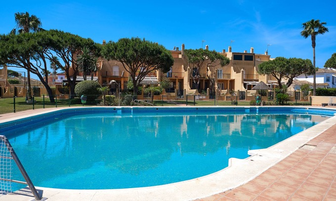 Poblado de Sancti Petri Casa | Adosado en Chiclana, La Barrosa, Sancti Petri, piscina comunitaria, cerca playa
