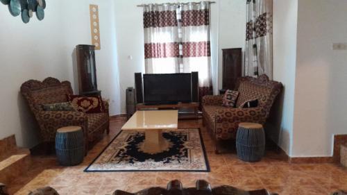 West Coast Division Apartamento | Afonta's Greenhouse Retreat