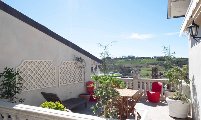 Ottiglio Apartamento | Ai Leoni Ruhhenti - Enchanted Terrace amidst the Golden Hills of Monferrato