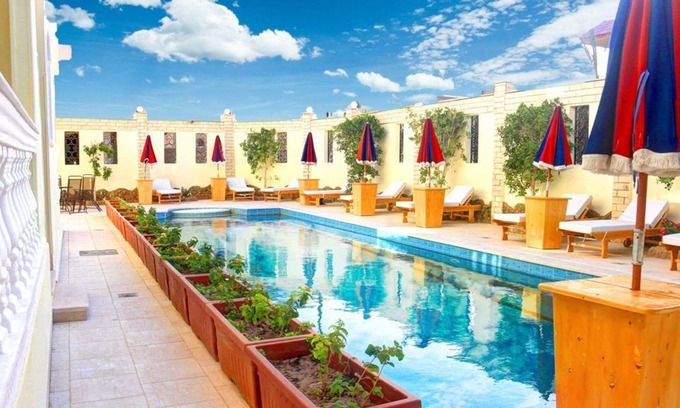 Al Ahyaa Apartamento | Aida Suites