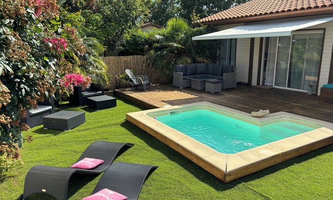 Biscarrosse Villa | PROMO a finales de agosto septiembre Casa de madera piscina climatizada spa internet bicicletas calma