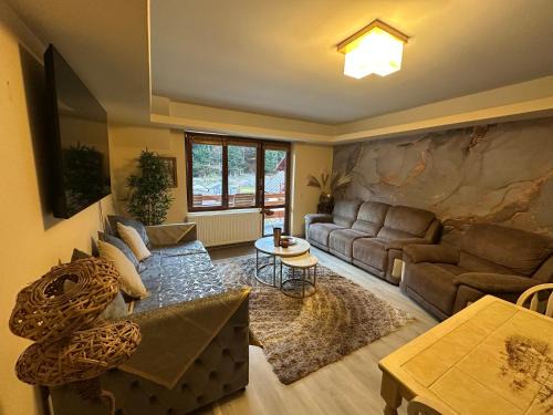 Busteni Apartamento | Alsama Zurqa