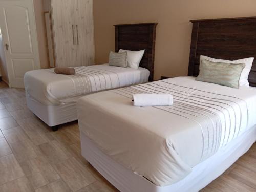 Klerksdorp Casa | AMANI PALMS GUEST HOUSE