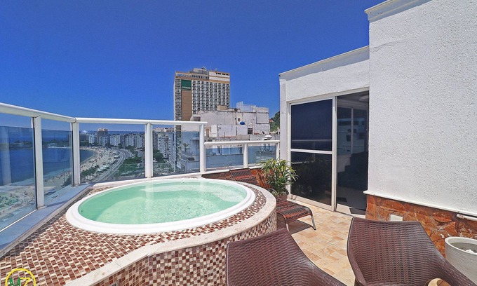 Copacabana Apartamento | Increíble ático con jacuzzi y vista frontal al mar