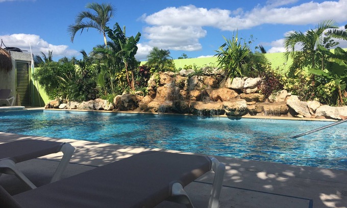Luis Donaldo Colosio Condominio | Amazing two bedroom condo steps from the beach