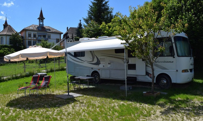Villars-le-Grand Casa | American Ford Hurricane motorhome, with slide.