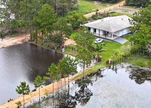 Jaguaruna Casa | Ampla casa de sítio com lagoa.