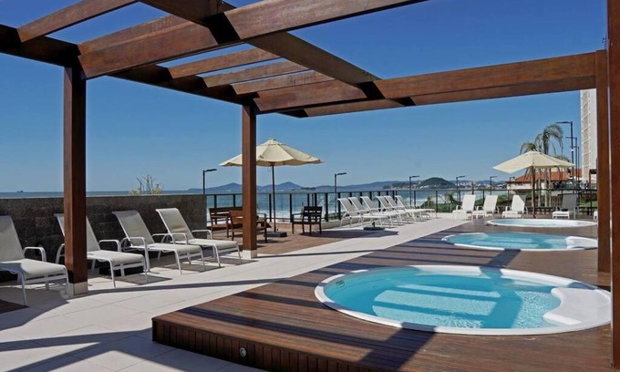 Barra Velha Apartamento | Apê pé na areia com vista mar e próximo ao Beto Carrero - Condomínio Vila Açoriana